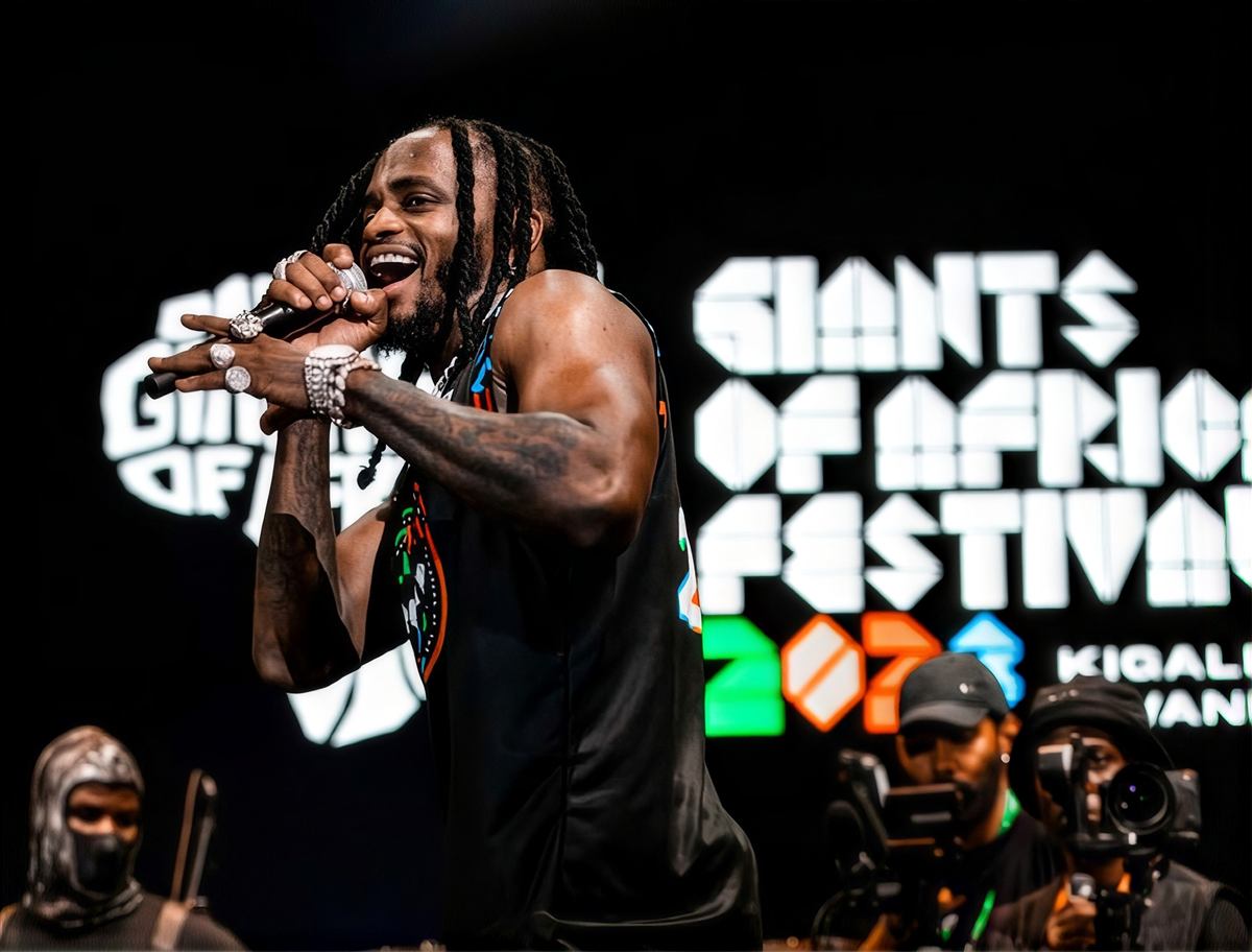 Performer on stage at the Giants of Africa Festival